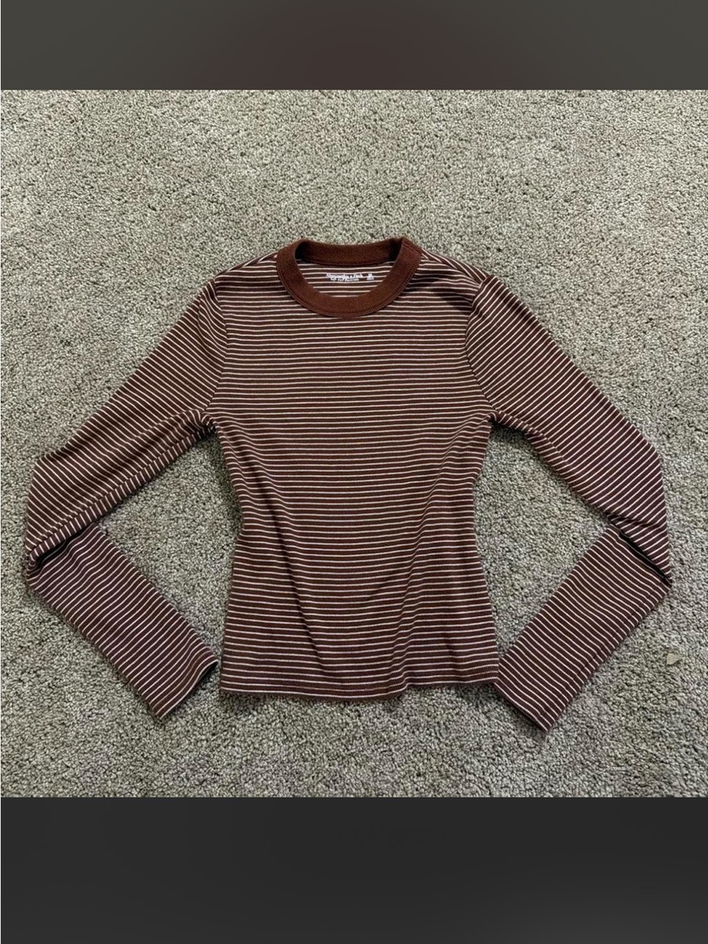 ISO: Abercrombie & Fitch Long-Sleeve
Ribbed Crew Top in brown and white stripes